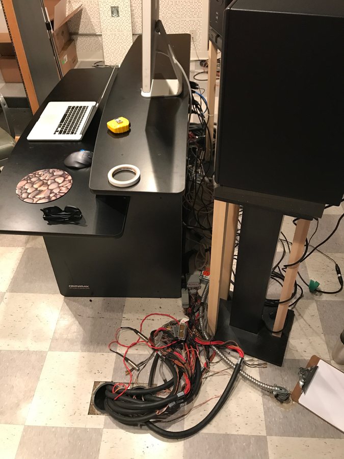 Studio B wiring under way, cables up through the floor behind the desk